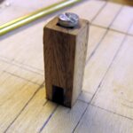 Er ist das Gegenlager des Klüverbaumes.