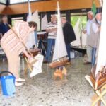 Die Taufpatin durfte die neuen Boote danach wieder trockenlegen und die Überflutung des Fußbodens beseitigen!