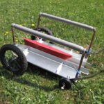 15 kg Blei auf den Trailer setzen.